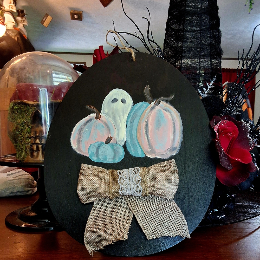 Hand-Painted Halloween Wall Decor with Ghost and Pumpkins.
